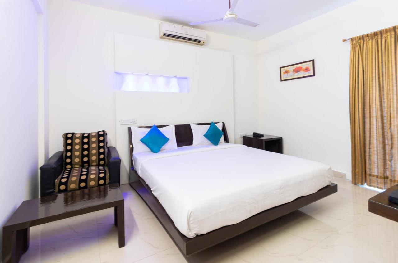 Sanctum Suites Domlur Бангалор Номер фото